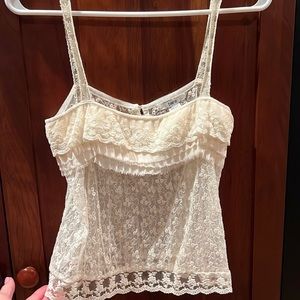 BarIII cream color lace camisole, size M. 2 fabric covered buttons on back.